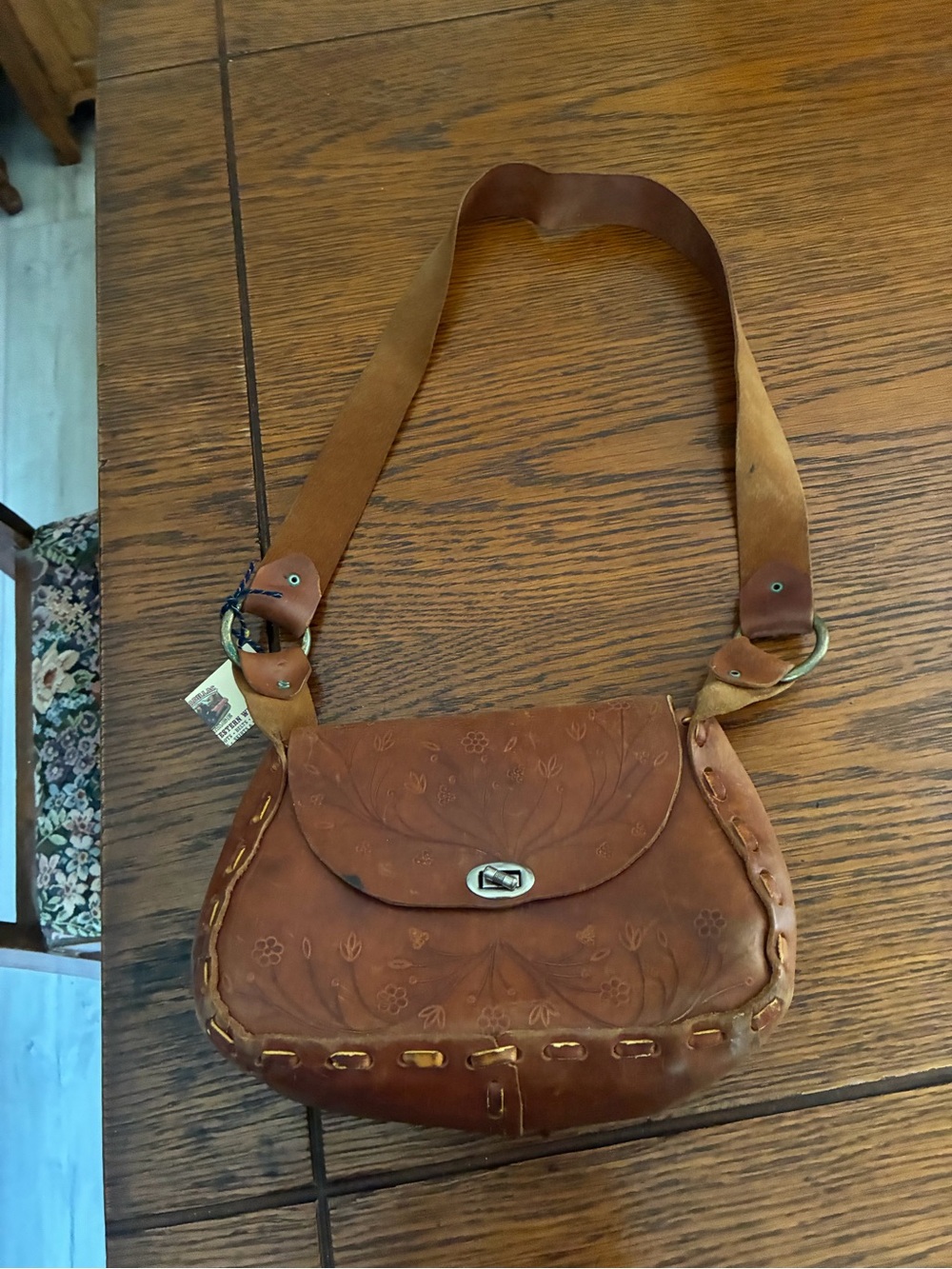 Handcrafted Brown Leather Shoulder Bag with Floral Embossing